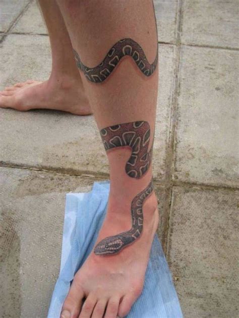 snake wrapped around leg tattoo|70 Snake Tattoo on Leg Designs to Wrap Your Head Around